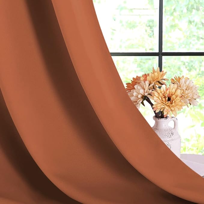 NICETOWN Thermal Insulated Burnt Orange Curtains Blackout Draperies, Window Treatment Solid Grommet Room Darkening Drape Panels for Bedroom (Set of 2, 70 by 54 inches Long)